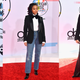 Illustration for article titled Statement Suits, Plush Pinks, and a Lotta Gowns on the American Music Awards Red Carpet